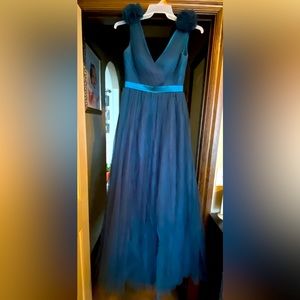 Size 4 prom dress. Teal, emerald, peacock blue. Pom poms on shoulder straps.